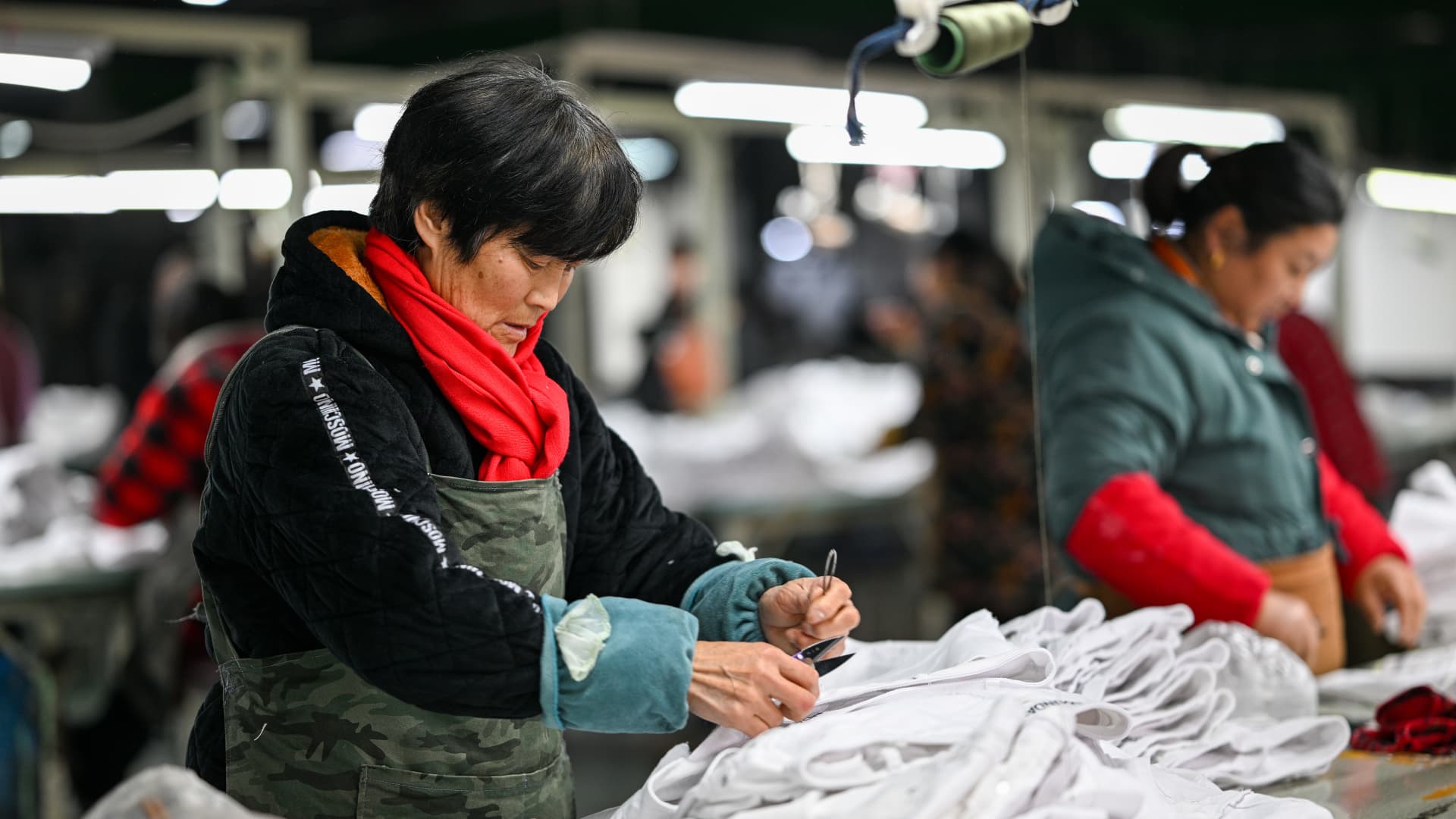 China PMI surprises as manufacturing unit exercise contracts in January; December industrial earnings bounce